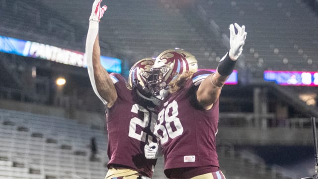 May 6, 2022; Birmingham, AL, USA; Michigan Panthers running back Stevie Scott III (25) and Michigan Panthers tight end Connor Davis (88) celebrate after Scott scored two points on a run during the second half at Protective Stadium. Mandatory Credit: Vasha Hunt-USA TODAY Sports  